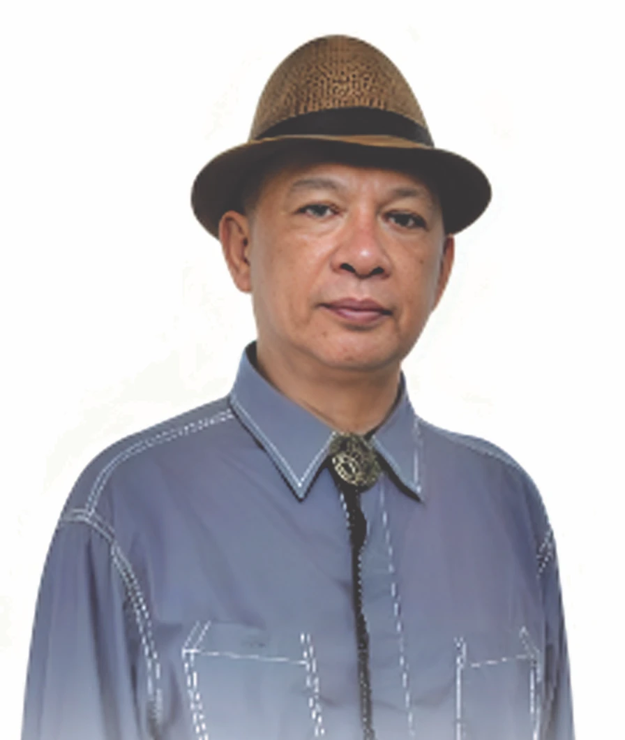 Portrait of Lander Blanza in a hat and blue shirt